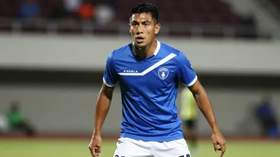 A photorealistic image of a Puebla player, wearing a blue jersey with a white stripe, and white shorts, with the player's...